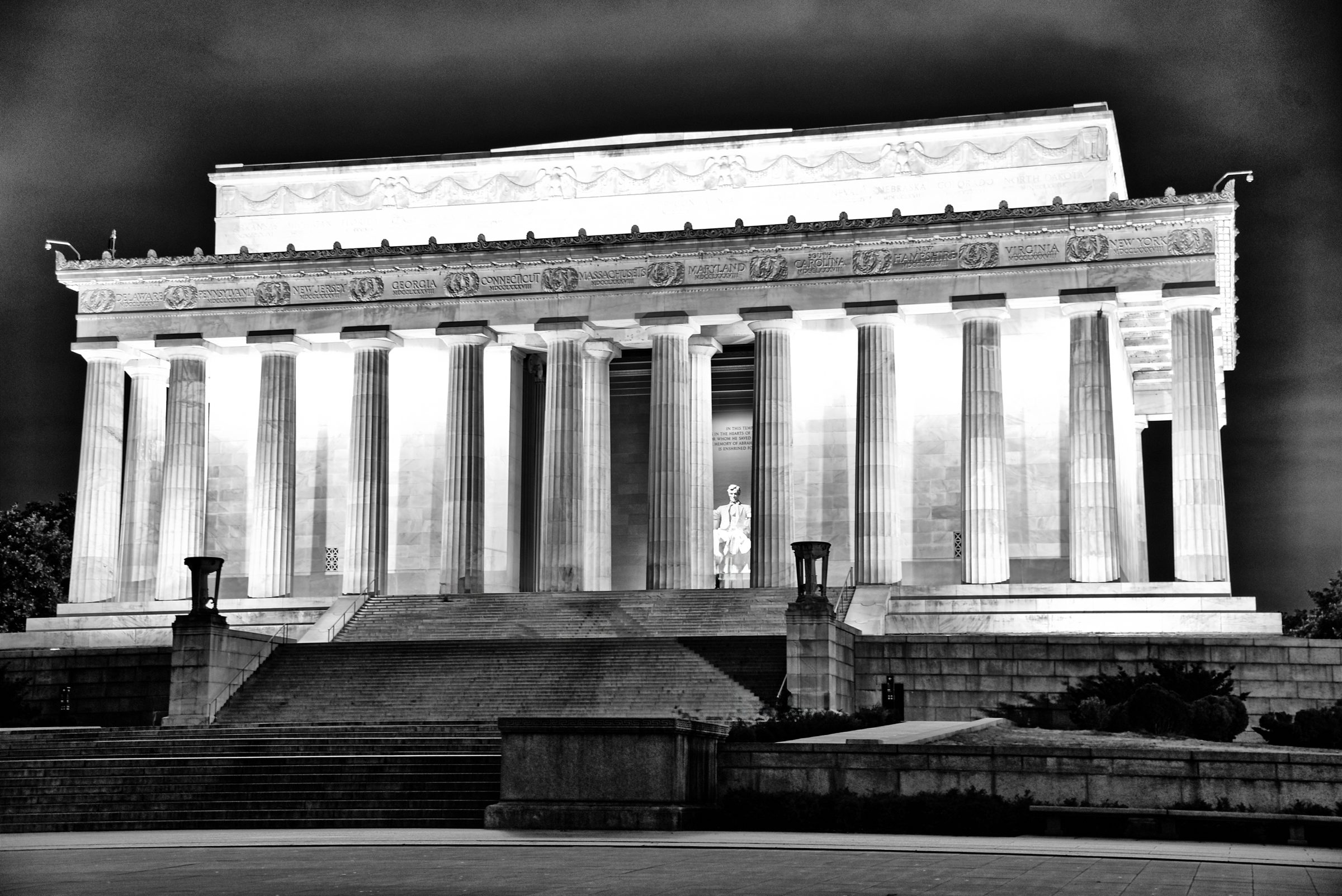 Greatness — Black sky, white marble, one great man - watching.